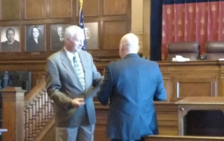 John Castrale, receiving the Sagamore of the Wabash in Supreme Court Room.